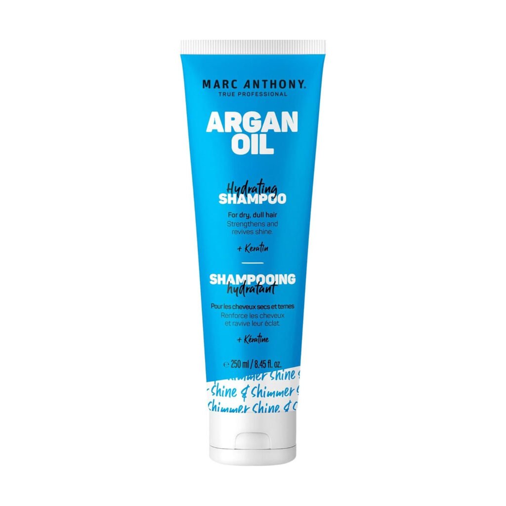 Blue shampoo bottle labeled ‘Argan Oil Hydrating Shampoo.’ Text highlights hydration for dry hair. White cap, minimalist design.