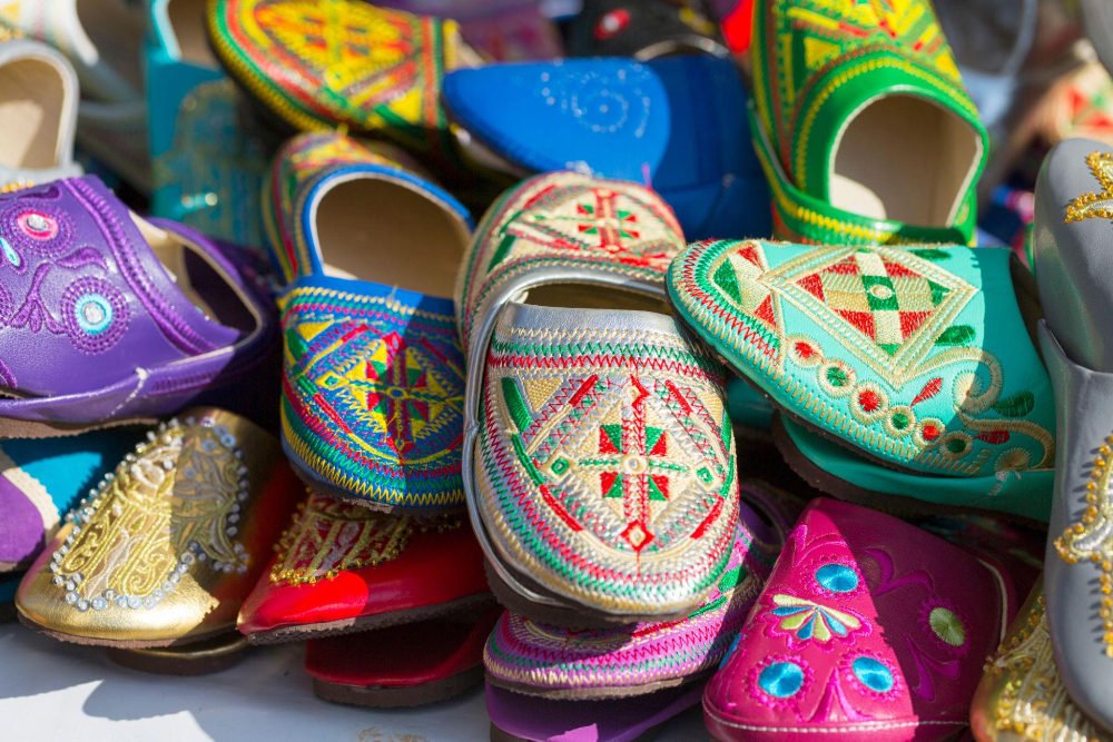 Traditional colorful shoes in a market in Tetouan, Morocco