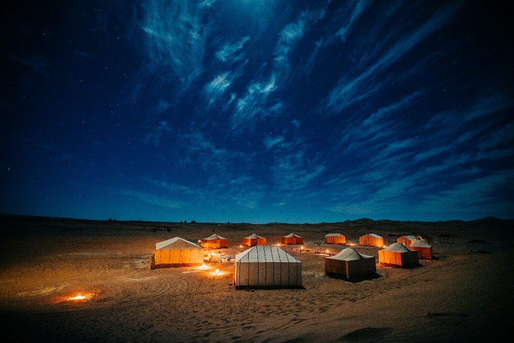 Sahara desert camp near erg chebbi morocco at night under the stars