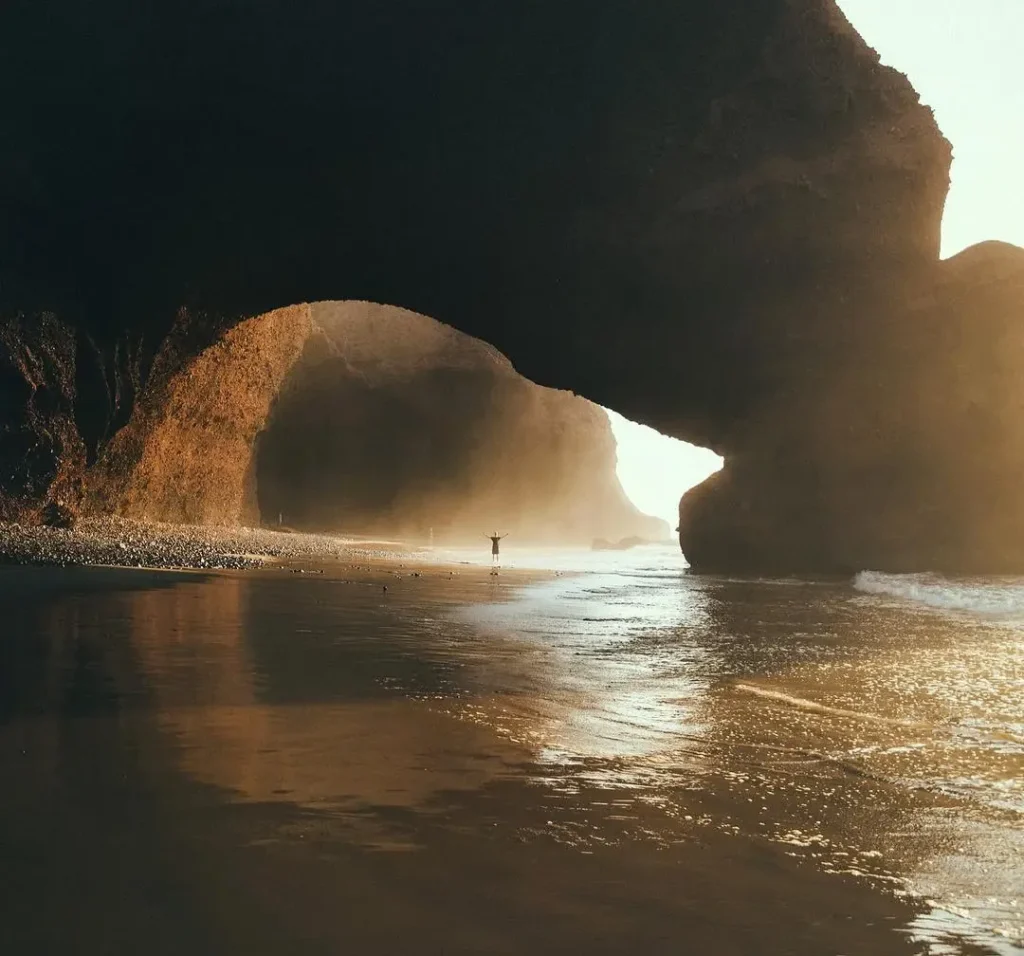 the famous arc in legzira beach in morocco